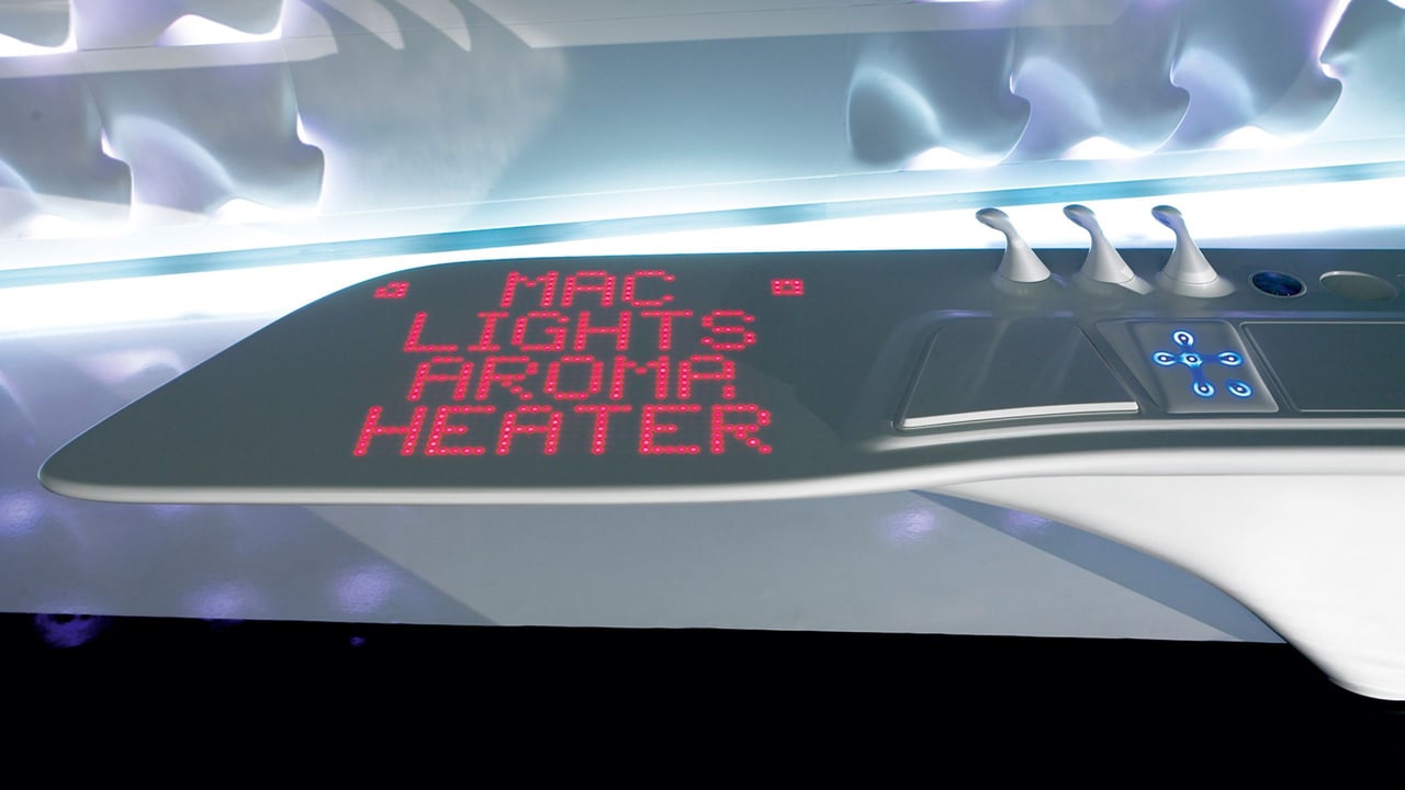 Nahaufnahme-der-fugenlosen-Corian-Arbeitsplatte-der-Z-Island-Kueche-mit-integriertem-roten-LED-Display-das-Funktionen-wie-MAC-und-HEATER-anzeigt