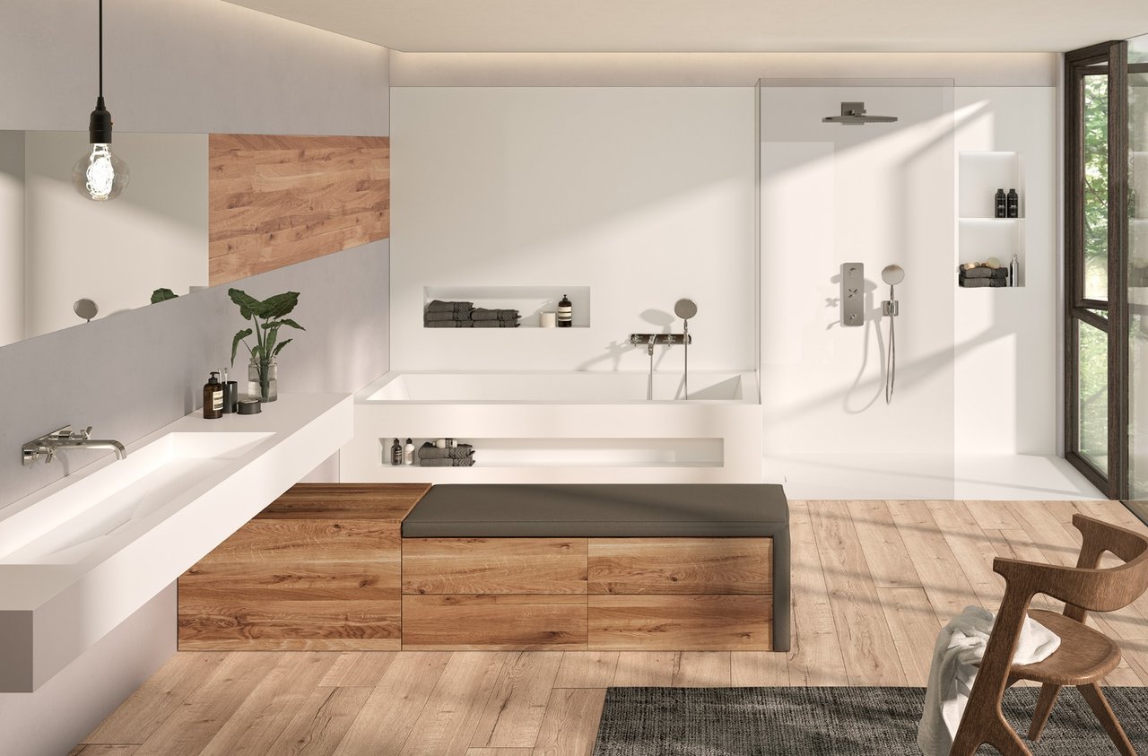 badezimmer-mit-waschtisch-und-badewanne-aus-weissem-mineralwerkstoff-holzfronten-und-grosszuegiger-dusche-mit-glaswand